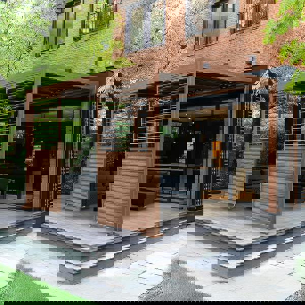 Wood effect aluminium pergola shutter panel in rich brown, featuring horizontal slats, enhancing outdoor space with modern elegance