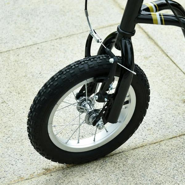 Close-up of black front wheel with grippy tire and disc brake on a silver rim.