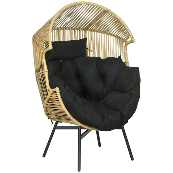 Black padded seat cushion in a woven rattan egg chair with curved arms