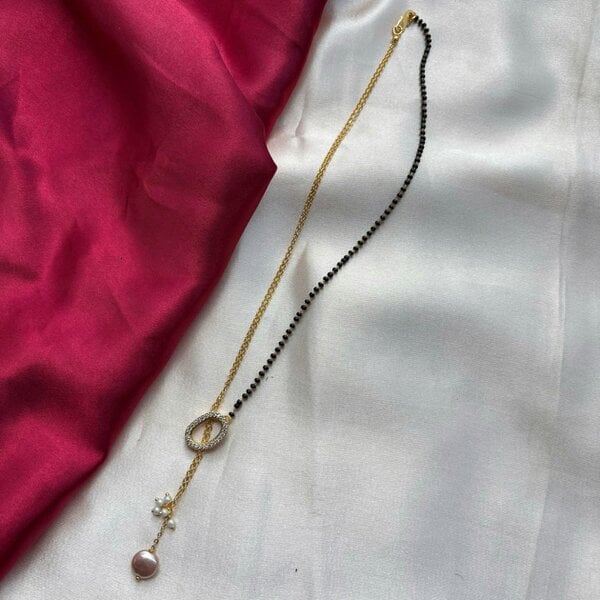 The Colourful Aura Half Black Bead Gold plated Oval Pearl Y shape Lariat Mangalsutra