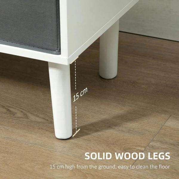 White TV stand on solid wood legs with raised clearance under the cabinet