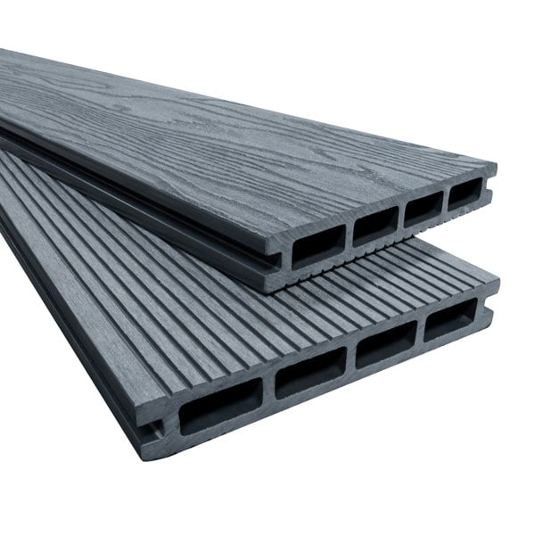 Grey composite decking boards with a textured surface, featuring grooves and hollow cores, ideal for outdoor flooring projects