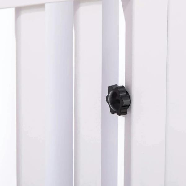 White playpen door latch with black knob on slatted gate frame