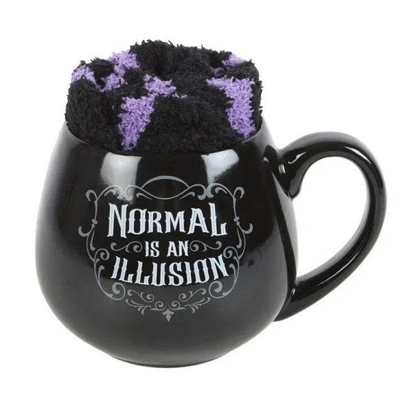 Black gothic mug with purple fuzzy rim and 'Normal is an Illusion' quote