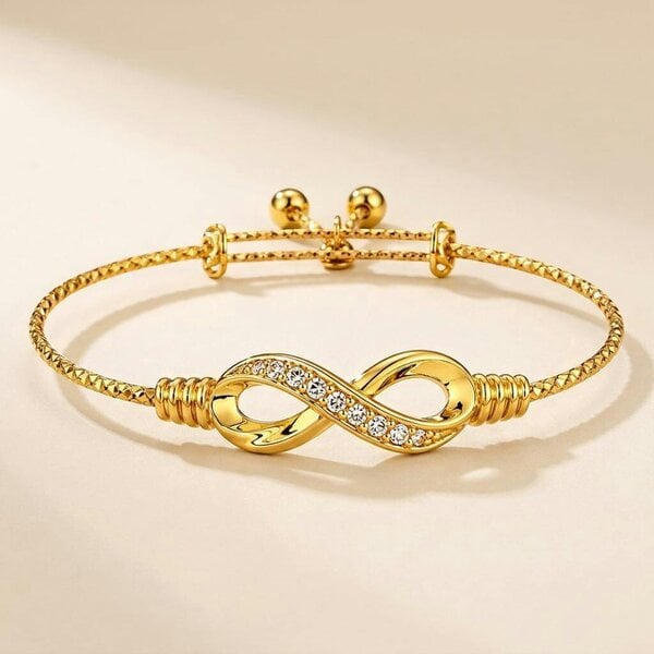 The Colourful Aura 18ct Gold Plated Infinity Crystal Adjustable Bangle Bracelet with Bell Charms