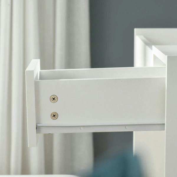 White vanity table drawer front with interior storage compartment