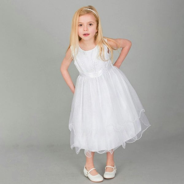 Girl wearing white Tiffany Flower Girl dress