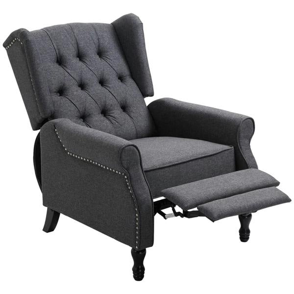 Dark grey recliner armchair with tufted back, wing sides, and extended footrest