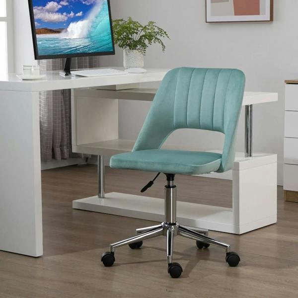 Green velvet mid-back swivel chair with padded seat and scalloped back for home office