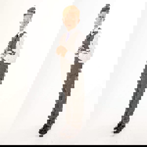 boy modelling tweed trousers and matching waistcoat