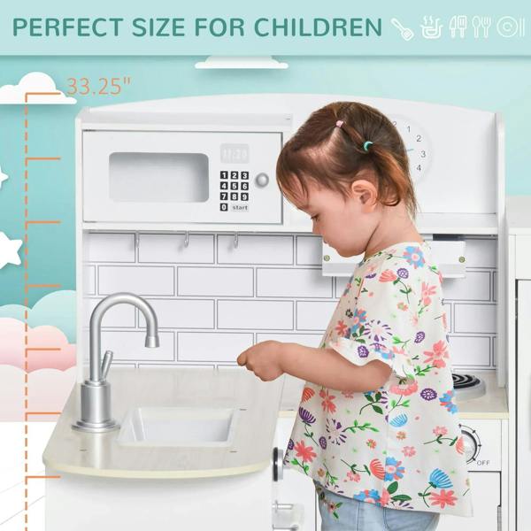 White kids play kitchen set with microwave panel and sink faucet, child reaching controls
