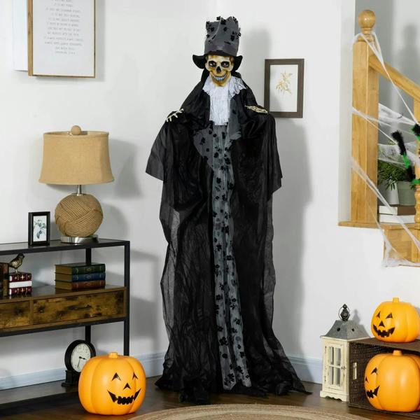 Black ghost bridegroom animatronic prop with skull face, top hat, and flowing robe with lace bib