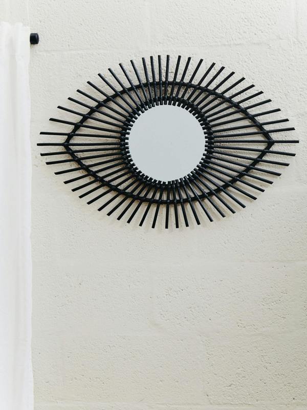 Interiors by Premier Mataram Black Natural Rattan Eye Shape Wall Mirror