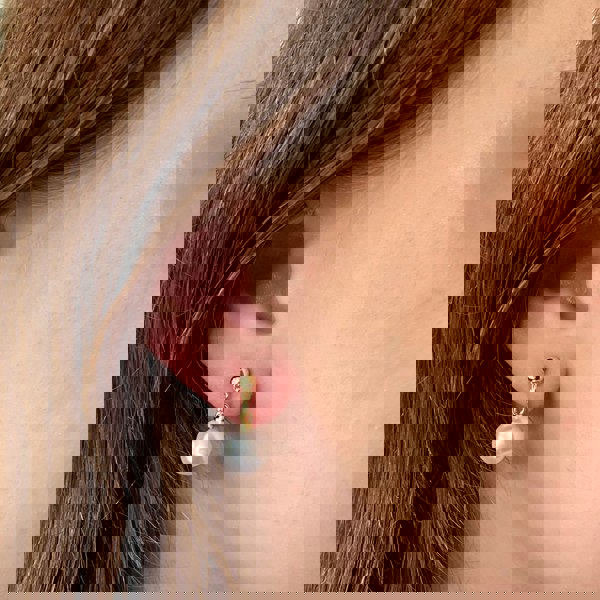 Gold pearl drop clip-on earrings, round faux pearl dangle, polished gold-tone stud top, delicate chain detail, classic vintage inspired jewellery, elegant statement accessory
