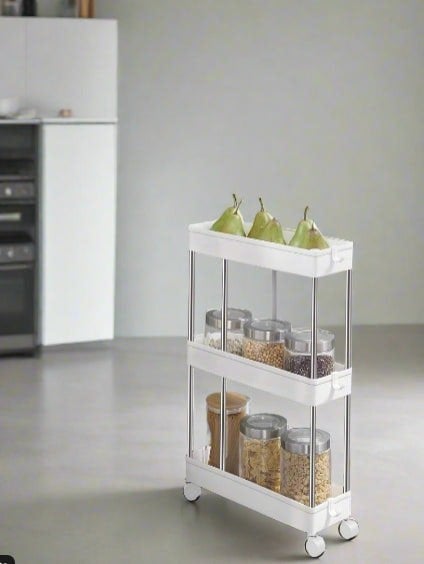 Slim white 3-tier rolling storage trolley with wheels and hooks, ideal for tight spaces in kitchens or bathrooms

