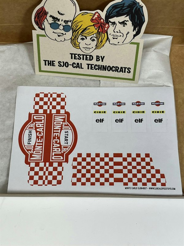 a box with a sign and a sticker