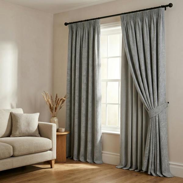 Axel made-to-measure curtains in Frost, styled in a living room