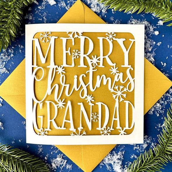 Personalised papercut snowflakes Christmas card showing Merry Christmas Grandad with mustard yellow insert