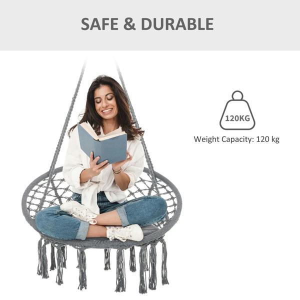 Grey macrame hanging rope chair with circular net seat, fringe tassels, and cushion