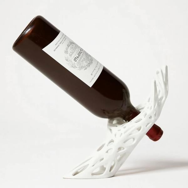 Flow Floating Wine Bottle Holder – Gravity Defying Wine Stand