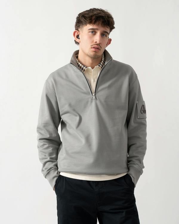 studio shot of a Moose Knuckles Hartsfield Mens 1/4 Zip Sweatshirt in Industry 1892