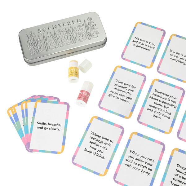 Set of cards with motivational phrases, two mini balms and a tin 