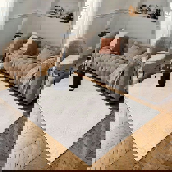 Living Room rug, cream colours, geometric, practicality in mind, the rug is anti-allergic.