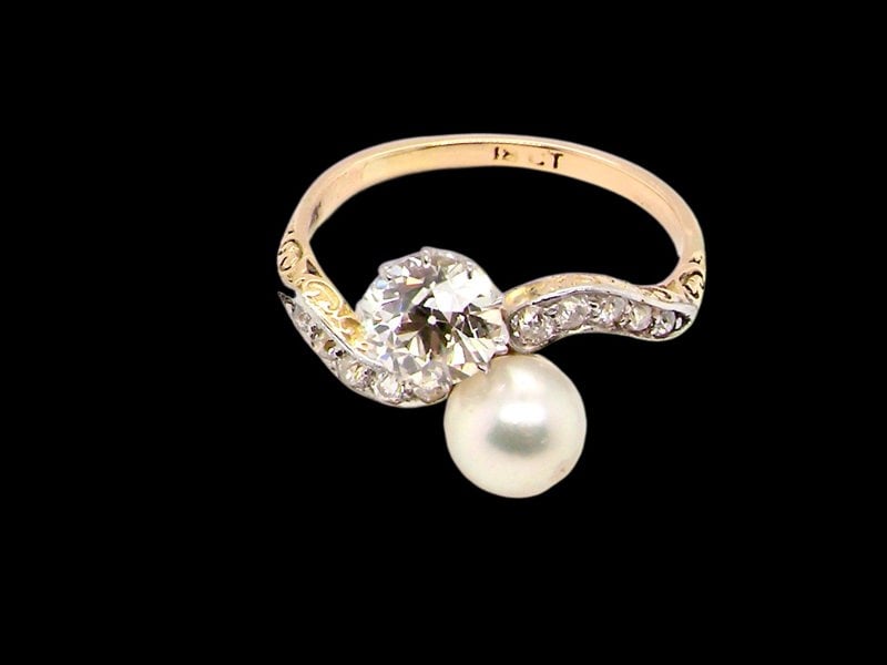 Vintage Tom A fine pearl and diamond two stone ring