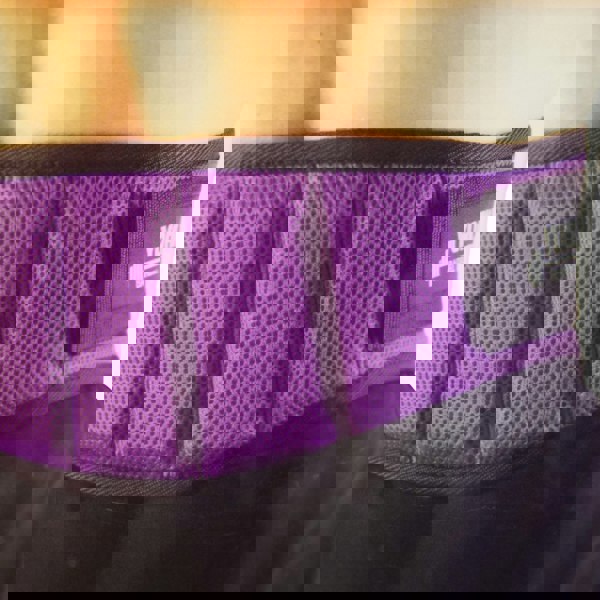 Wearing the purple gym workout belt