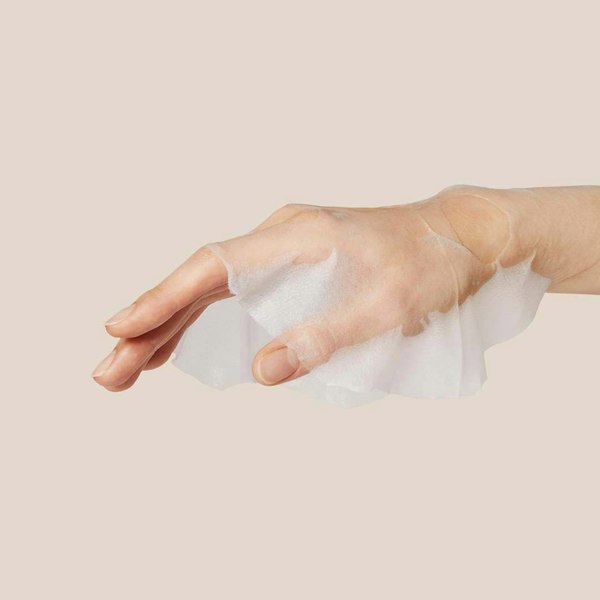 Eco-friendly soft sheet of APRILSKIN Carrotene IPMP Mask – High-adhesion Korean mask drenched in clarifying and hydrating serum at Atelier De Glow UK.