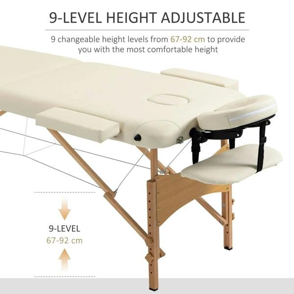 Cream portable massage table with padded headrest, wooden frame, adjustable legs