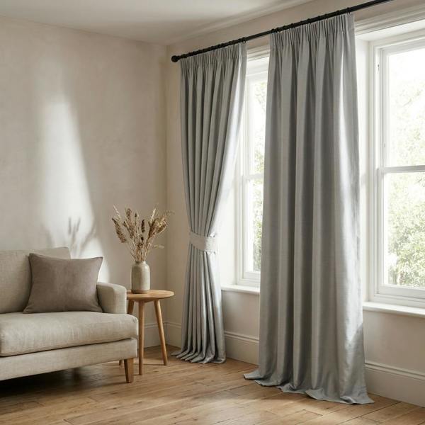 Faux Silk made-to-measure curtains in Silver, styled in a living room
