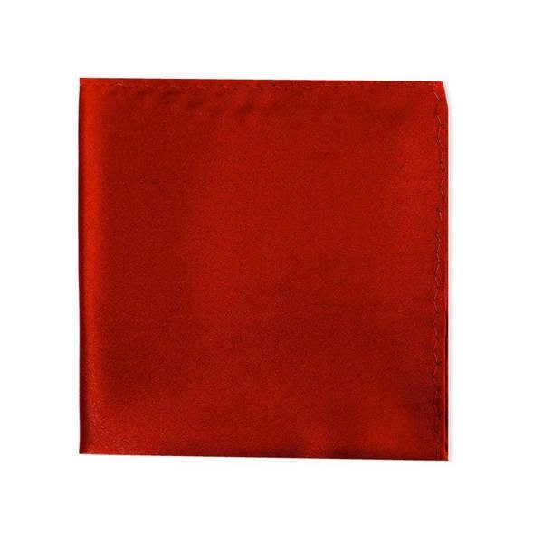 PAMONI classic plain pocket square in four colors, folded for display with smooth fabric and subtle edges.