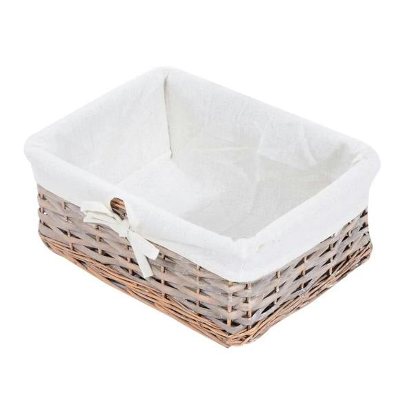 Woven wicker storage basket with white fabric liner and tied handle loop