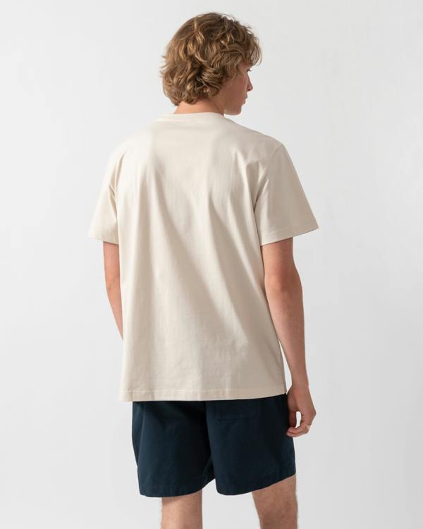 back shot of a model wearing a Fjallraven Multicolor Logo Mens T-Shirt in Chalk White 113