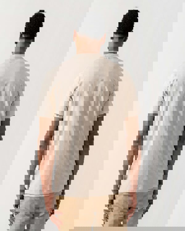 Model wearing BOSS Green Mens Tee Stretch Cotton T-Shirt with Contrast Logo in Light Beige 275 -  back