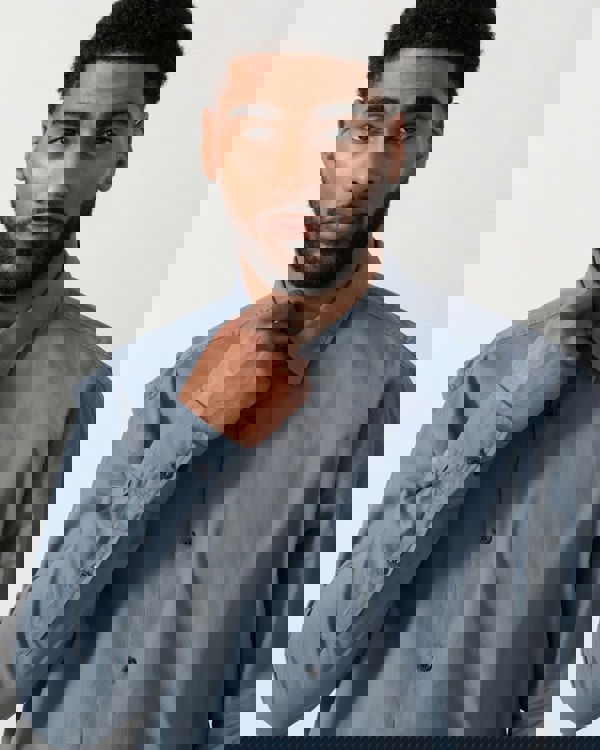 Model wearing HUGO Ermo Slim-Fit Shirt in Stretch-Cotton Canvas in Open Blue 496 - detail