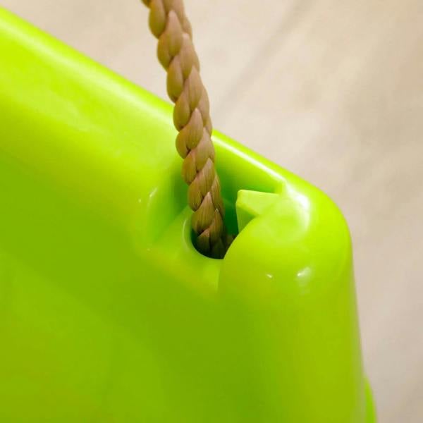 Braided rope tied to the green swing seat base attachment point