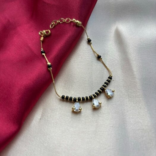 The Colourful Aura Black Bead Mangalsutra Zircon drop gold nazar Bracelet
