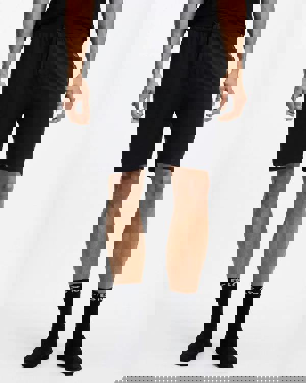 Model wearing BOSS Orange Authentic Mens Loungewear Shorts with Stripe and Logo in Black 004 - Front