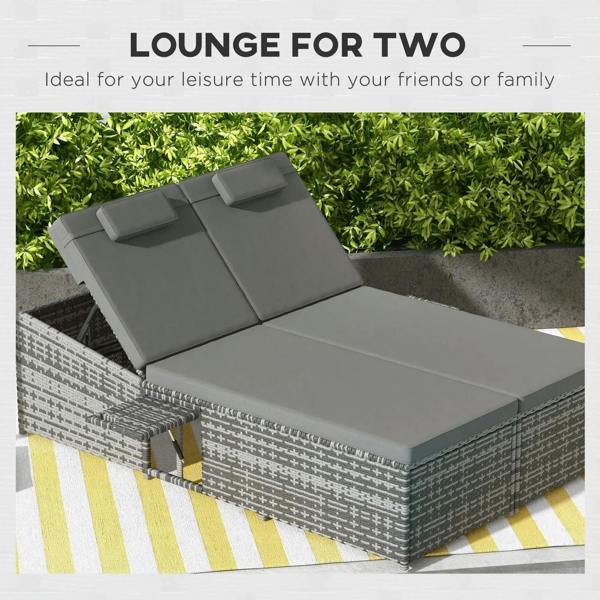 Grey two-seater rattan day bed with padded cushions and two support backrest sections