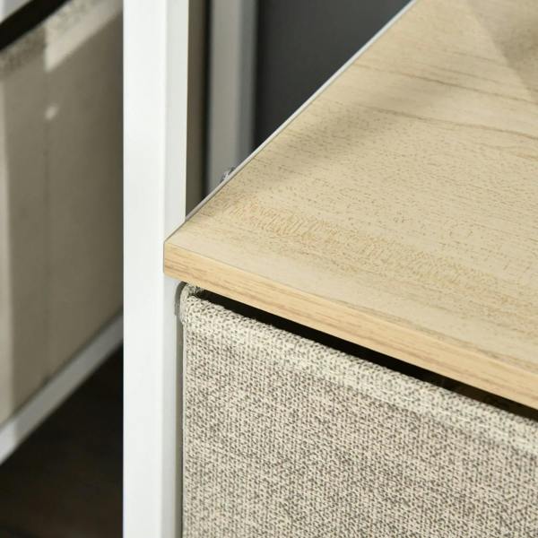 Maple tabletop edge above a grey fabric drawer on a white TV stand frame