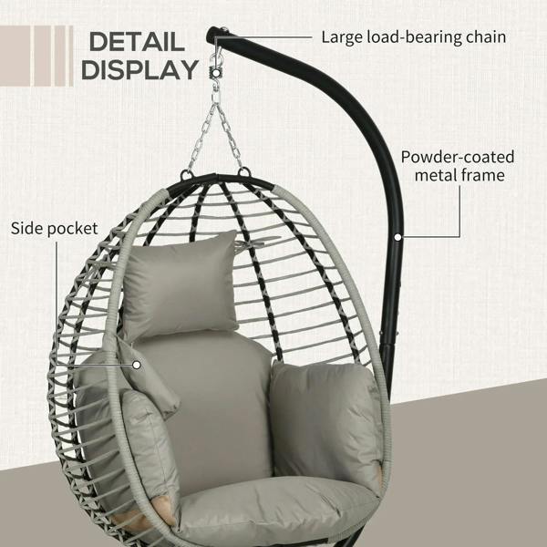 Grey hanging egg chair with hanging chain, powder-coated metal frame, and side pocket