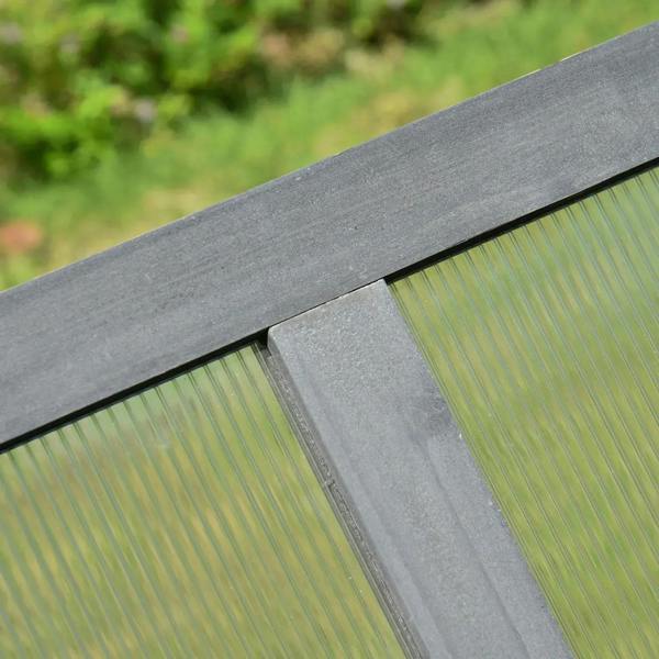 Grey frame top rail with clear polycarbonate panel on a small cold frame greenhouse