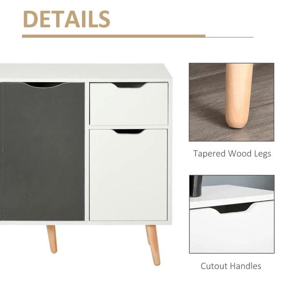 White drawer fronts with cutout handles and tapered wood legs on grey cabinet