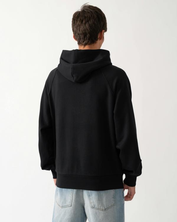 back of a model wearing a Moose Knuckles Mens Yul Pullover Hoodie in Black 292