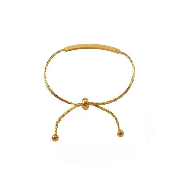 Gold bracelet on a white background