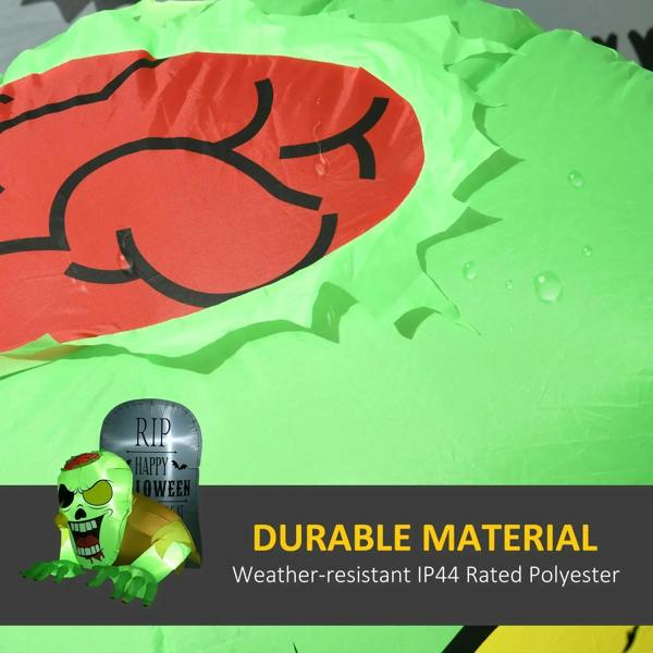 Close-up of green inflatable zombie design with RIP Happy Halloween graphic and LED glow