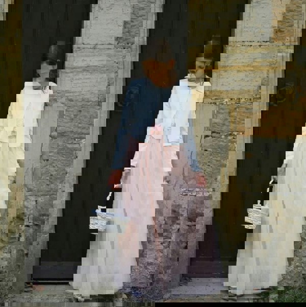 young flower girl in church way