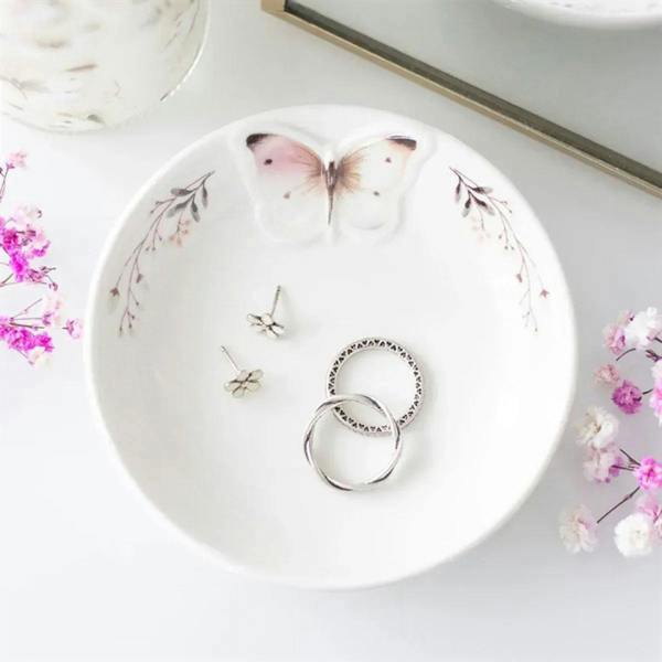 Butterfly trinket dish with pink butterfly illustration, holds rings and small jewelry